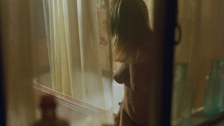 Rosanna Arquette desnuda, escena de sexo de Nowhere to Run (1993)