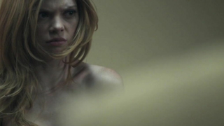 Escena erótica de Dreama Walker de Compliance (2012)