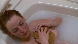 Virginia Madsen desnuda, escena de Candyman (1992)