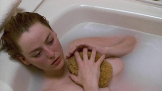 Virginia Madsen desnuda, escena de Candyman (1992)